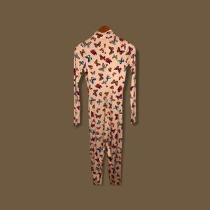 Nude butterfly long sleeve jumpsuit